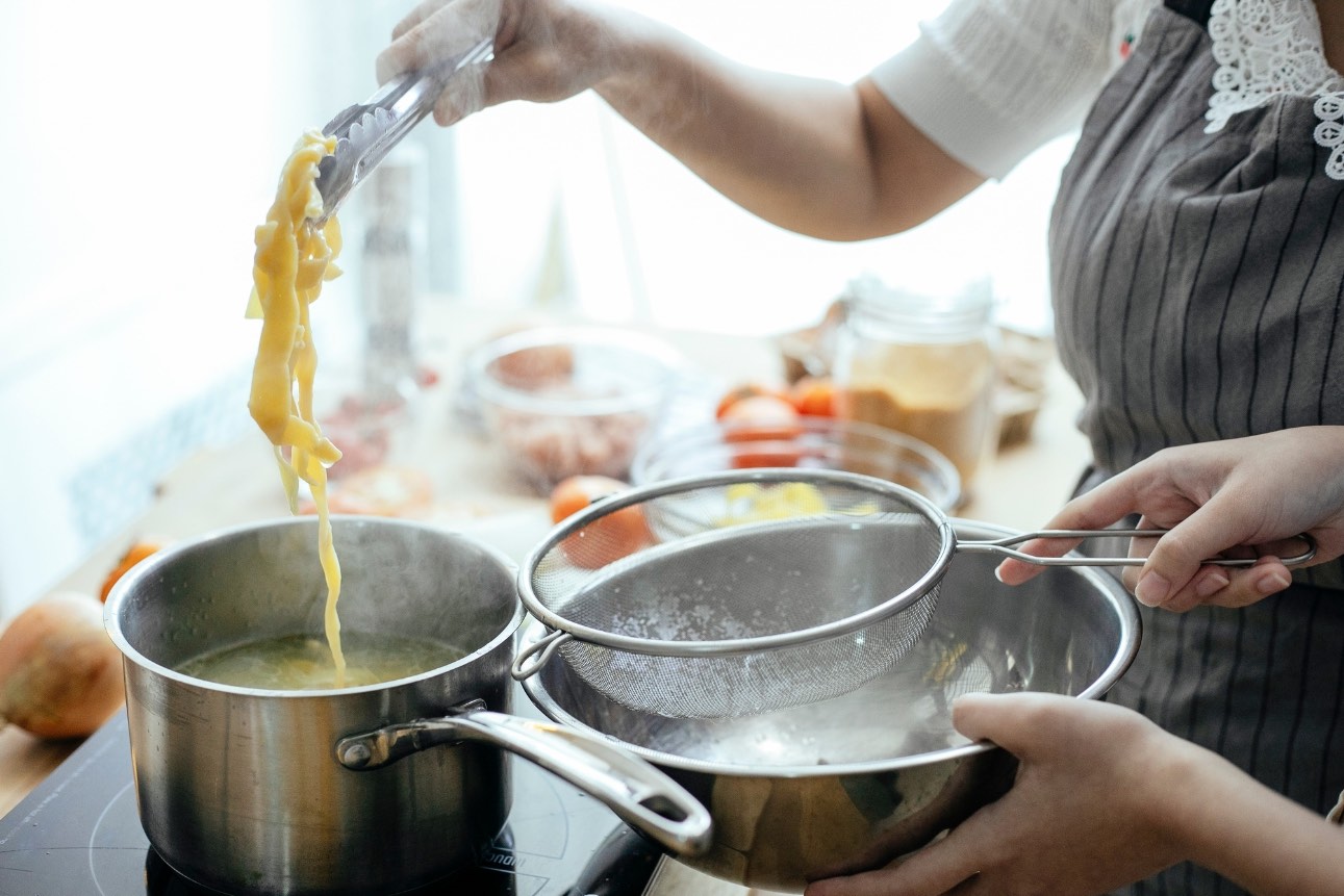 Young women cooking in their kitchen